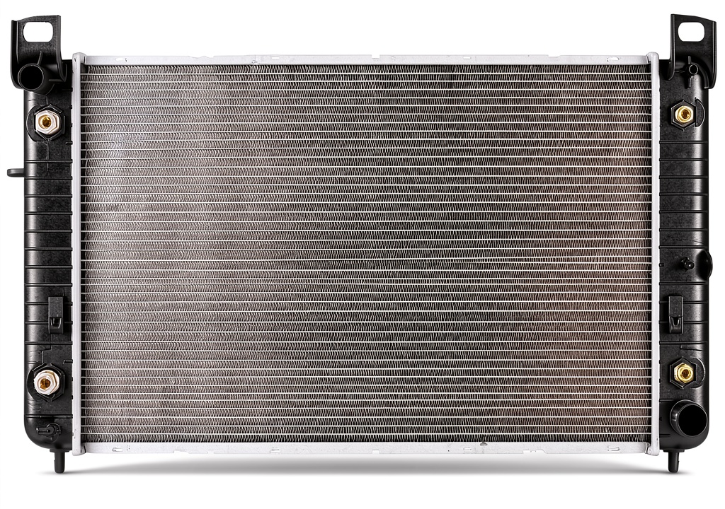 Installing Autoexact 0472 Radiator for Chevy Gmc Cadillac on a garage workbench